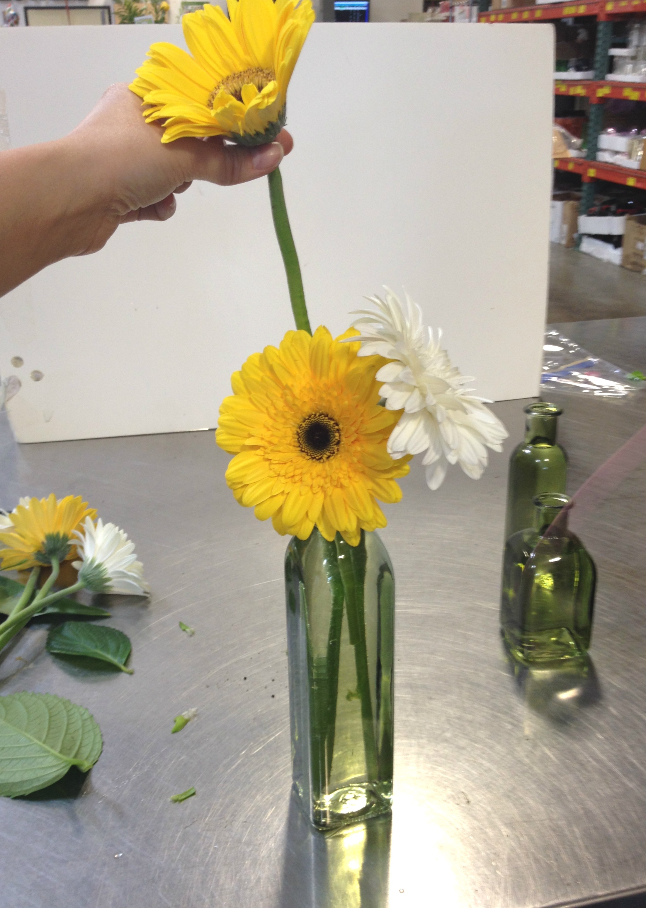 how to make a gerbera bud vase arrangement